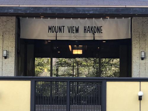 a sign on a front window of a mount view havemite at Mount View Hakone in Hakone