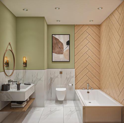 a bathroom with a tub and a toilet and a sink at Hotel Bawa Regency in Mumbai