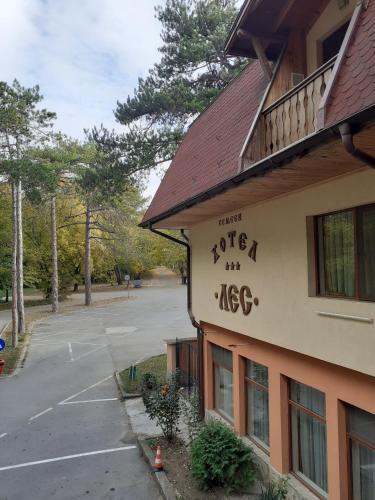a building with writing on the side of it at Hotel Les in Razgrad