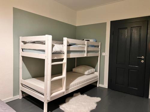Postel nebo postele na pokoji v ubytování Haus Tilia Karinthië Appartementen