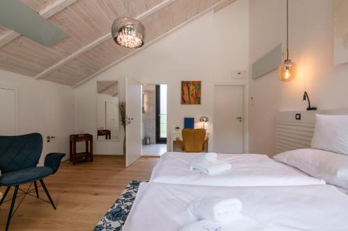 Postel nebo postele na pokoji v ubytování Resort CATTALEYA