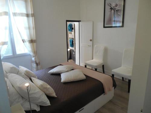 Katil atau katil-katil dalam bilik di COSY PLACE Aix-en-Provence, centre historique, WIFI Fibre Optique gratuit