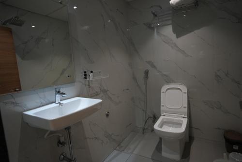 Koupelna v ubytování Eden Park Boutique Hotel