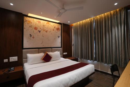 Postel nebo postele na pokoji v ubytování Eden Park Boutique Hotel