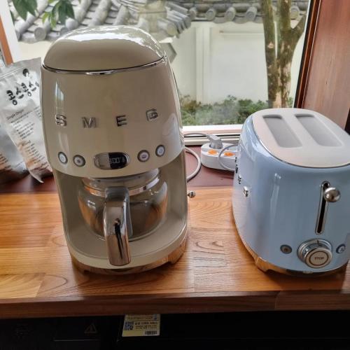 a kitchenaid mixer sitting on a wooden counter at Yeonriji in Gyeongju