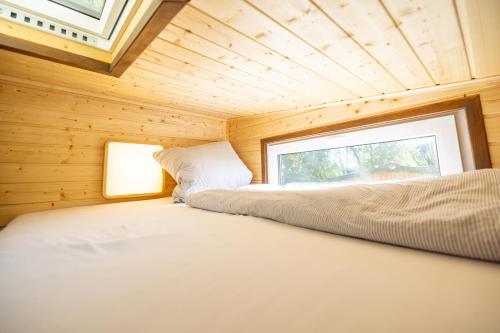 Postelja oz. postelje v sobi nastanitve Tiny Haus - Im Herzen vom Unterallgäu