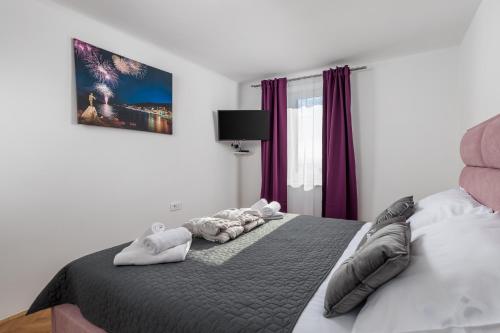 Postel nebo postele na pokoji v ubytování Apartment OpatijaResidenz