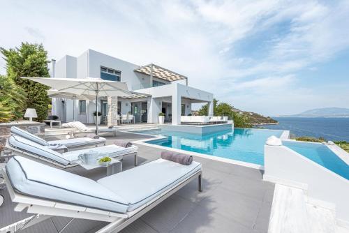 an image of a villa with a swimming pool at Villa Soligia Blue in Pefkali