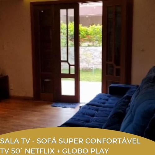 Ruang duduk di Dara House e eventos com piscina aquecida, sauna, Jacuzzi e área gourmet para festas de até 200 pessoas