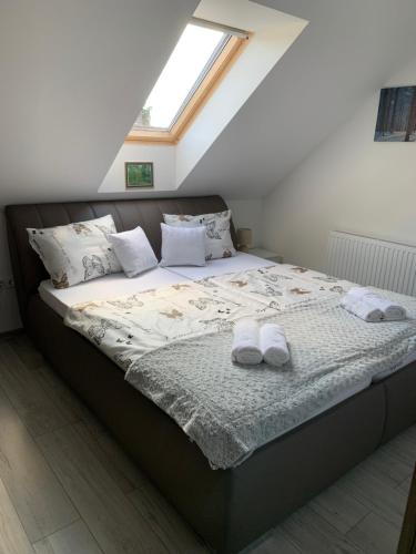 Posteľ alebo postele v izbe v ubytovaní Fodan Apartman