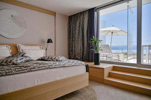 Postel nebo postele na pokoji v ubytování Bevanda Hotel & Restaurant - Unique Adriatic