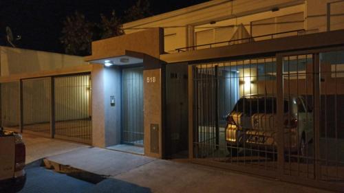 a car parked inside of a building with glass doors at LA ESTACION in Gualeguaychú