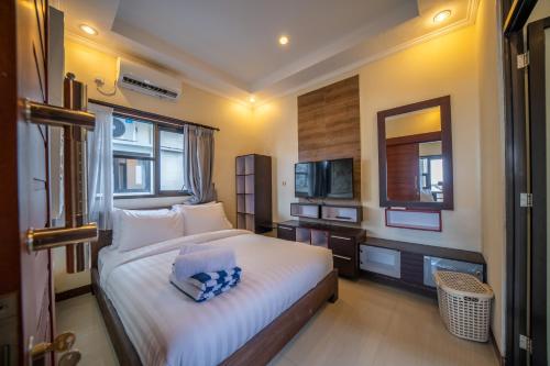 Katil atau katil-katil dalam bilik di Padma Lodge Legian