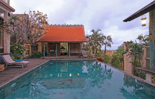 Majoituspaikassa Villa Uma Priyayi tai sen lähellä sijaitseva uima-allas