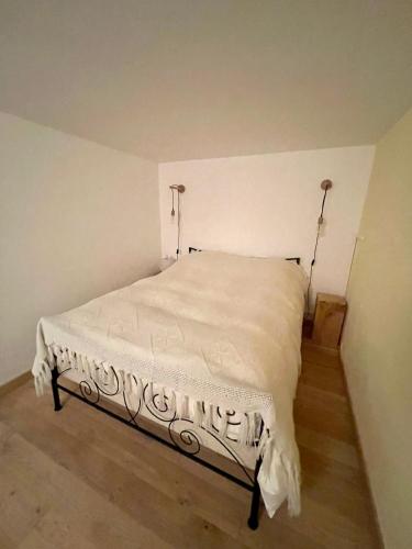 Postel nebo postele na pokoji v ubytování L'ATELIER - Piscine - Dans les vignes - Cassis