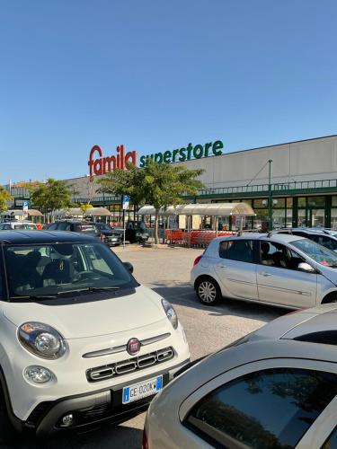a group of cars parked in a parking lot at RESORT VILLAGE AQUA MARINA FAMILY - Daily Rooms Tidying - CocktailsBar- Pet Friendly - with Hypermarket - Delivery Restaurant-Pizzeria - Room Breakfast with supplement - Ultra Fast Wi-Fi - Play Area for children - Olympic Swimming Pool - Parking in Caorle
