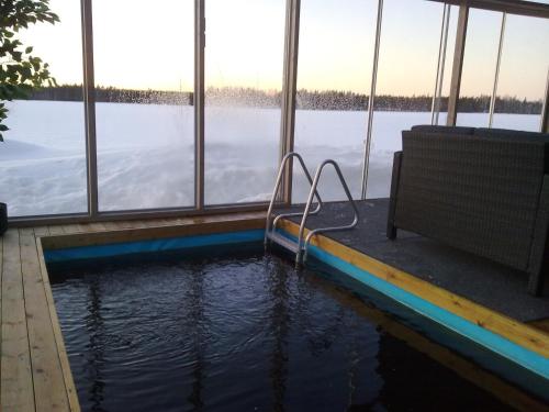 Haarusmaa Holiday Apartment Härmä tesisinde veya buraya yakın yüzme havuzu