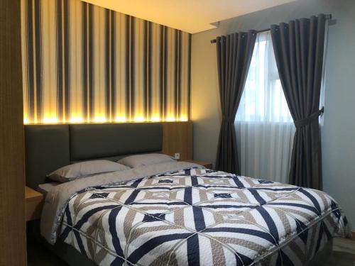 Postel nebo postele na pokoji v ubytování Apartment Bintaro Icon