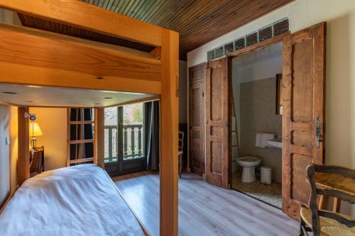 Katil atau katil-katil dalam bilik di Chambres d'hôtes les Murès du Mercantour