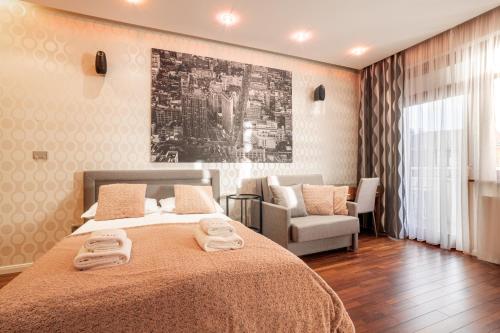 Posteľ alebo postele v izbe v ubytovaní Broadway - Neptun Park by OneApartments