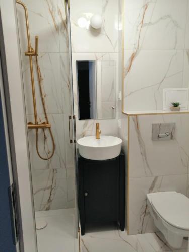 Ένα μπάνιο στο Apartament Kętrzyn