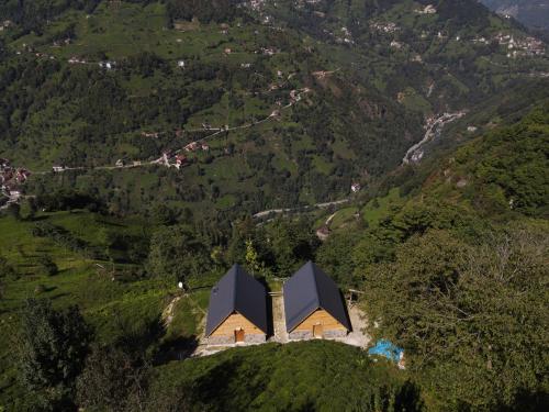 an aerial view of a church on a hill at ONASUITBUNGALOW in Rize