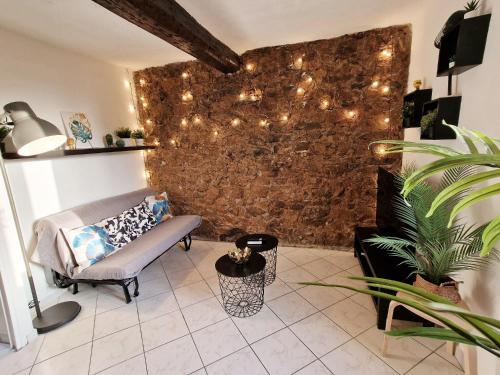 Televízia a/alebo spoločenská miestnosť v ubytovaní GregBnb - T2 Design 30m2 - Ouest