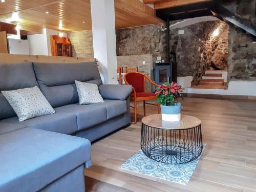 Uma área de estar em Cal Magí Casa de ubicación ideal en el Pirineo