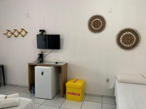 Μια τηλεόραση ή/και κέντρο ψυχαγωγίας στο Pousada Meu Xodó