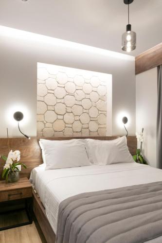 Ένα ή περισσότερα κρεβάτια σε δωμάτιο στο ridos house