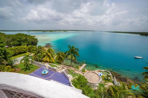 an aerial view of a large body of water at Casa Árabe in Cenote Azul