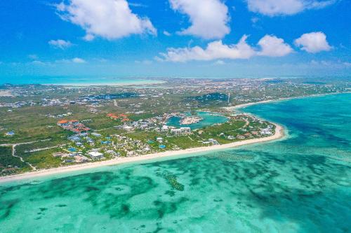 an aerial view of a beach and the ocean at Sea Esta Studio III - Cozy for Couples! in Turtle Cove