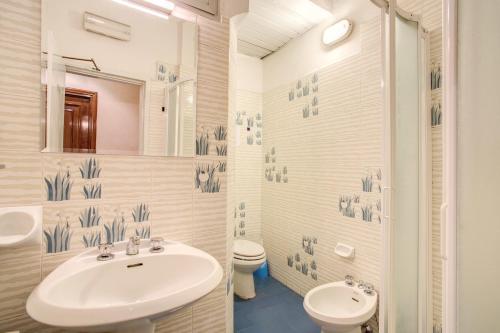 Ванная комната в Hotel Lorena