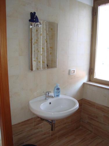 Koupelna v ubytování B&B Casa Ferrara