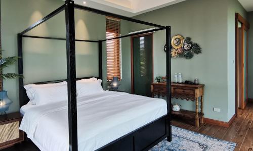 Una cama o camas en una habitación de Rice Villa Chiang Mai