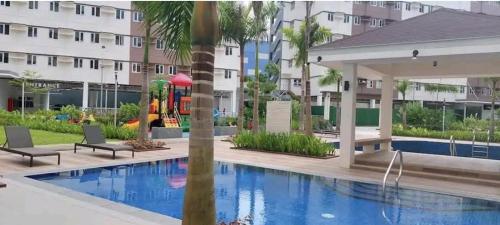 a view of a swimming pool at a hotel at Staycation ni Inday in Trece Martires