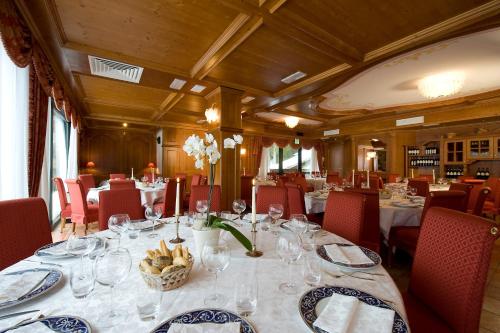 Restoranas ar kita vieta pavalgyti apgyvendinimo įstaigoje Chalet Al Lago