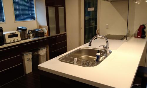 Avanti Chalet Hakuba by Jade Groupにあるキッチンまたは簡易キッチン