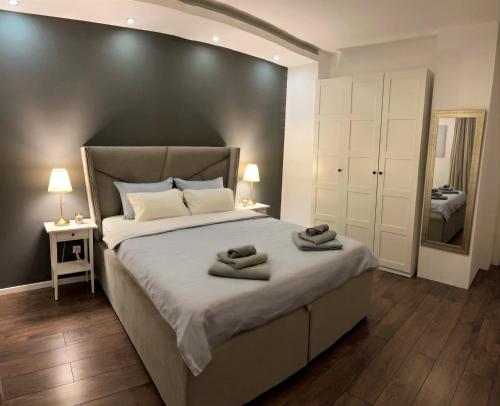 Cama o camas de una habitación en Allure of Belgrade (80m2-861ft2)