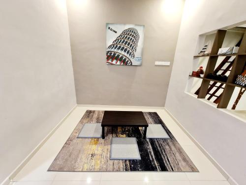 a room with a floor with a picture on the wall at Air-home No135 Kampung Boyan, 3BR, 6pax Netflix in Taiping