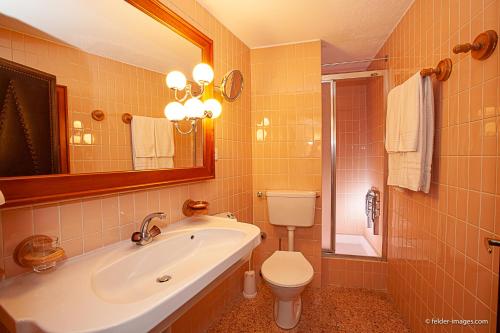 Koupelna v ubytování Hotel Astoria