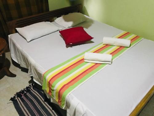 Postel nebo postele na pokoji v ubytování Akila's Hideaway