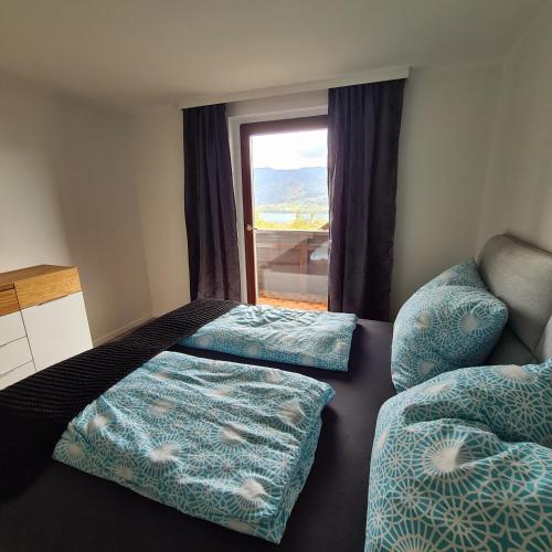 Кровать или кровати в номере Ferienwohnung St. Josef