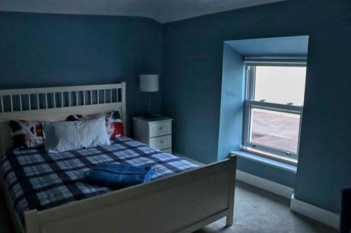 Postel nebo postele na pokoji v ubytování Seaside Cottage - Tramore
