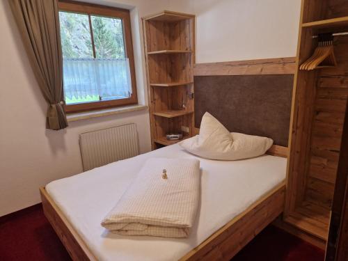 Postel nebo postele na pokoji v ubytování Landhaus Ennemoser