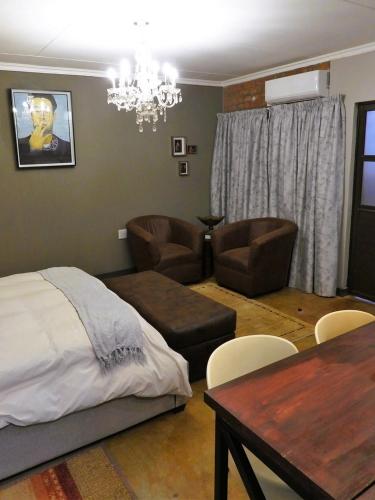 Χώρος καθιστικού στο Maretlwane Guesthouse