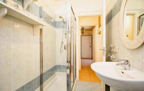 a bathroom with a sink and a shower at Sweet home tuscany in Bientina