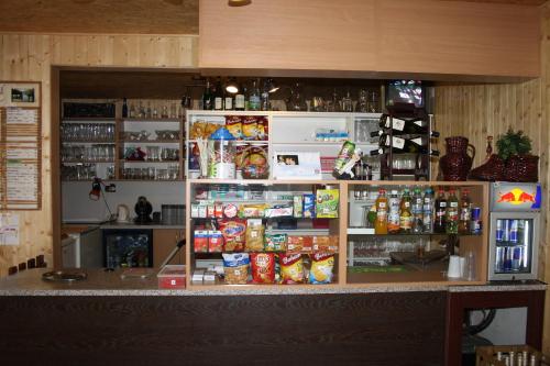 a store with a counter with food and drinks at Letní rekreační středisko Schiffler Miroslav in Samopše