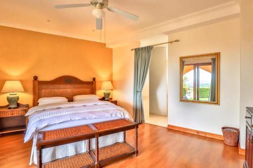 Letto o letti in una camera di Apricot Gardens Guesthouse