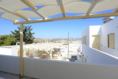 a view from the balcony of a house at The White Suites in Adamas